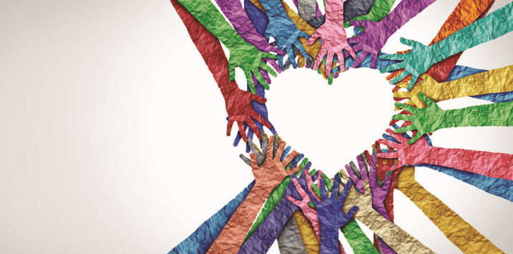 Multiple colorful, textured paper hands reach toward the center of the image, forming a heart shape against a light background—symbolizing unity, support, community, and Accessing Recovery through collective Recovery Supports.