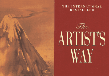 Book cover for The Artist’s Way by Julia Cameron, featuring a sepia-toned mountain illustration on the left and the title with “The International Bestseller” in bold white and gold text on a red background, celebrating creativity.