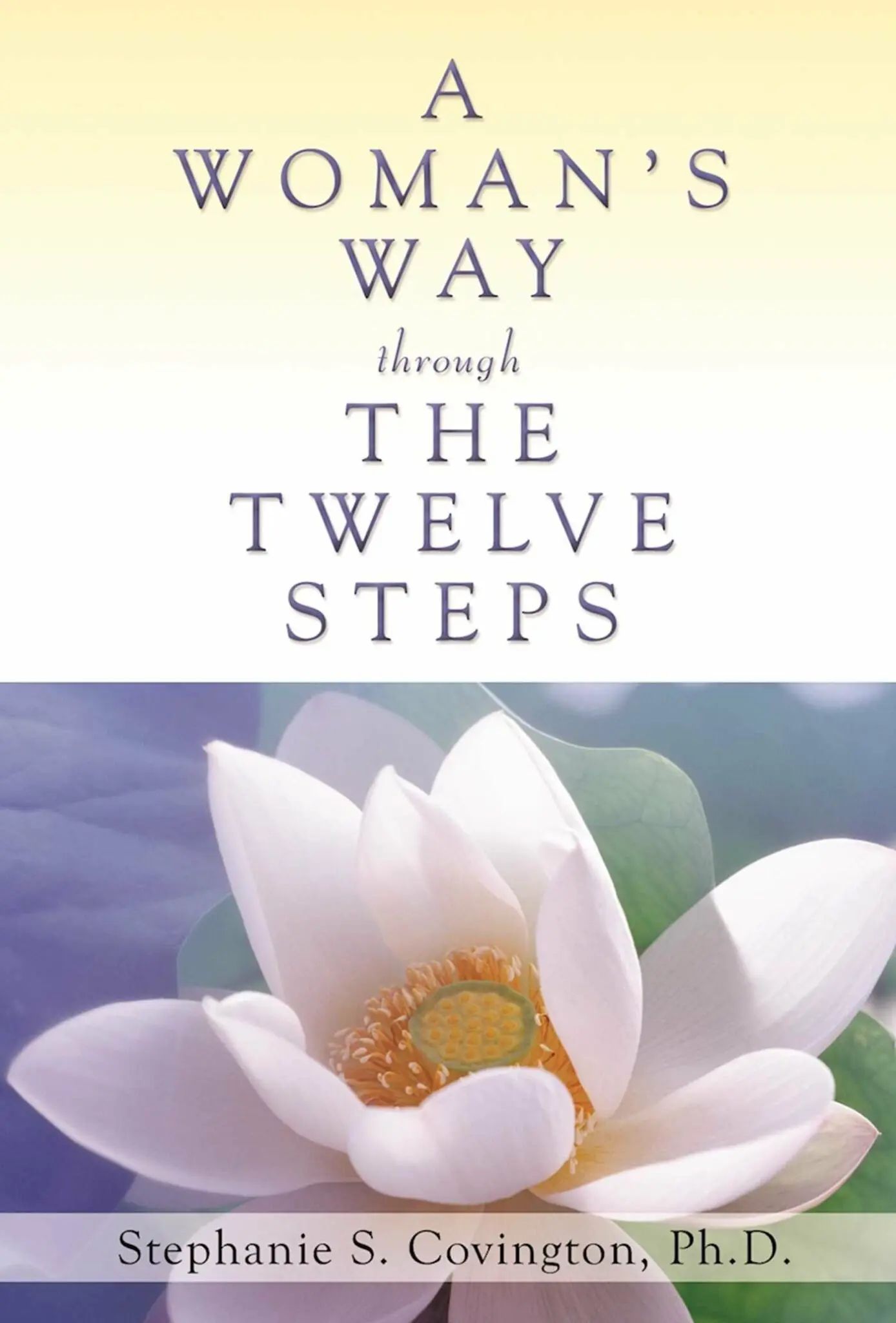Book cover with title text and white lotus flower with yellow center against blurred blue and green background.