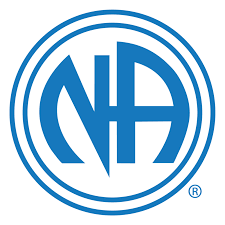 Black and white circular logo featuring the overlapping letters N and A in a stylized design, representing Narcotics Anonymous, surrounded by two concentric rings. The registered trademark symbol appears in the lower right.