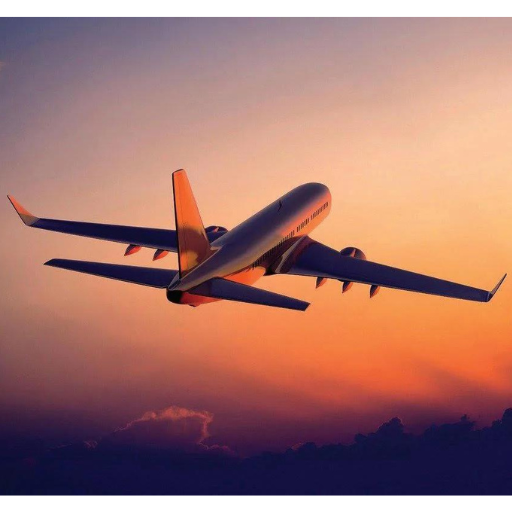 Commercial airplane flying upward against an orange and purple sunset sky.