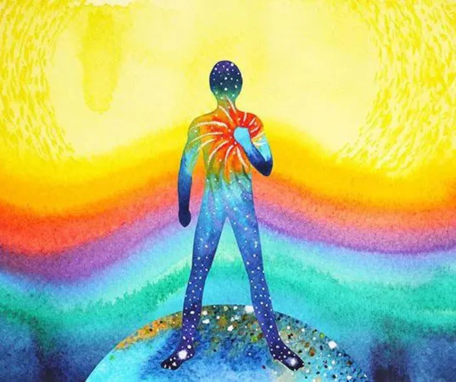 Watercolor figure filled with stars and rainbow bands, one hand resting over the heart.