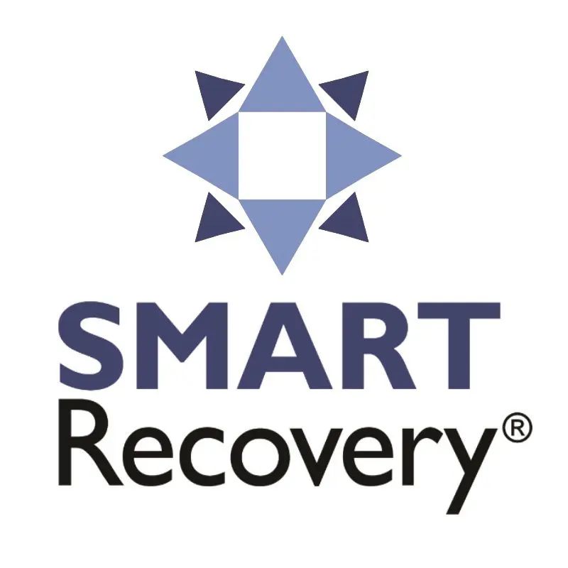 SMART Recovery logo featuring a blue and navy geometric star design with white center and text below.