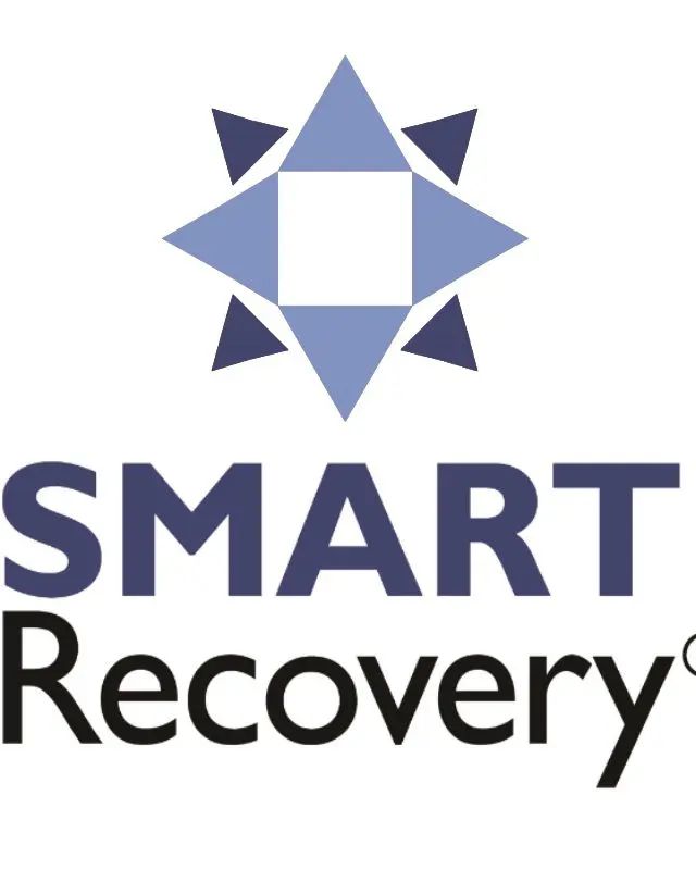 SMART Recovery logo featuring a blue and navy geometric star design with white center and text below.